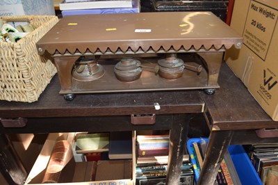 Lot 619 - A copper food warmer