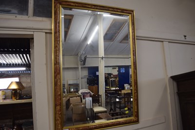 Lot 666 - A floral and gilt framed wall mirror with...