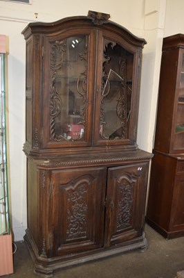 Lot 673 - Oak bookcase cabinet with glazed upper section...