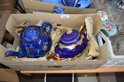 Lot 683 - Two blue and gilt decorated teapots