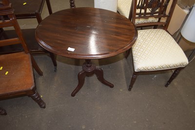 Lot 760 - An oval tilt top table