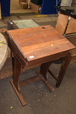 Lot 787 - A child's pine flip-top desk