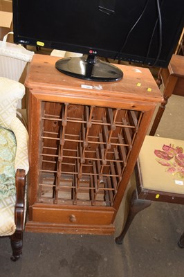 Lot 799 - Pine wine rack and single drawer