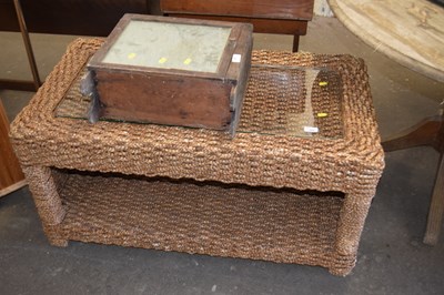 Lot 806 - A plaited rush and glass topped coffee table