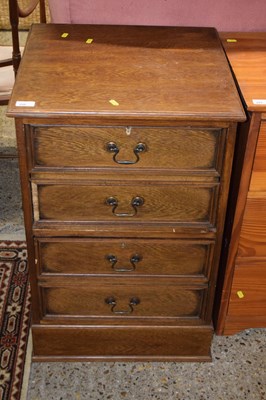 Lot 250 - An oak veneered two drawer filing chest