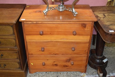 Lot 251 - A modern pine three door chest