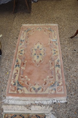 Lot 273 - Chinese patterned floor rug