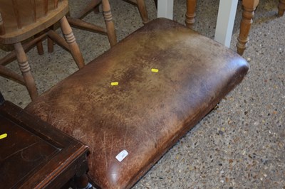 Lot 285 - A Victorian style leather covered footstool on...