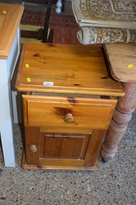 Lot 287 - A pine bedside cabinet