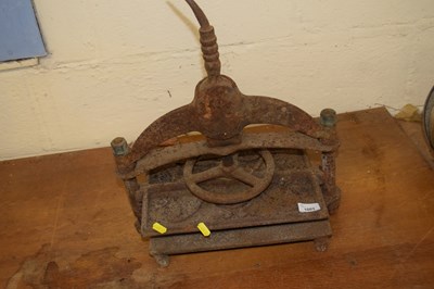 Lot 1003 - A cast iron book press