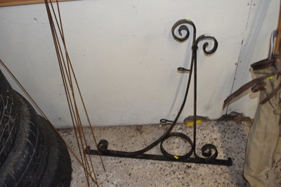 Lot 1019 - A metal sign hanging bracket