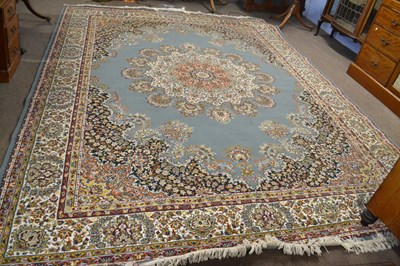 Lot 700 - A modern Kashan type rug with a floral design...