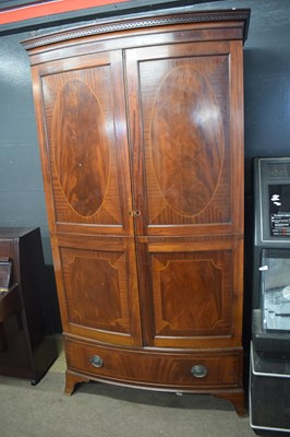 Lot 258 - Large mahogany bow front armoire with inlaid...
