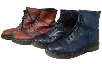 Lot 146 - Two pairs of Dr Martens boots: a pair of black...