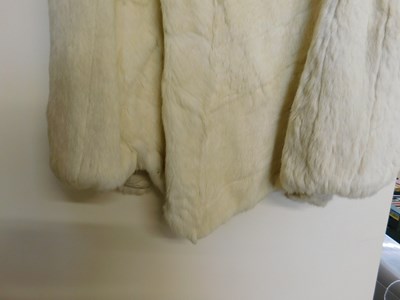 Lot 98 - A lady's full length cream fur coat, with high...