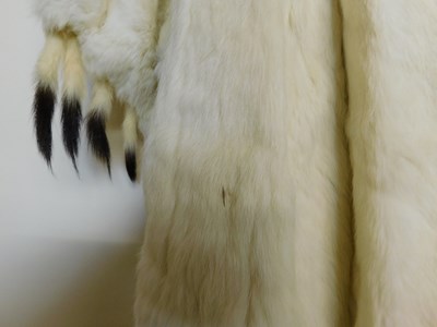 Lot 98 - A lady's full length cream fur coat, with high...