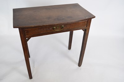 Lot 271 - Small Georgian oak side table with bow front...