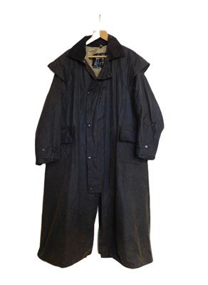 Lot 217 - A Barbour 'Stockman' coat, full length wax...