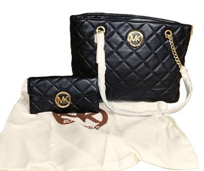 Lot 135 - A Michael Kors black quilted leather handbag...