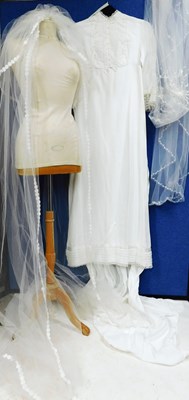 Lot 89 - A circa 1960's/70's wedding dress with lace...