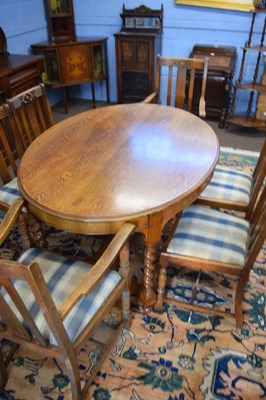 Lot 280 - Early 20th century oval oak dining table...
