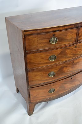 Lot 290 - Late Georgian mahogany bow front chest of two...