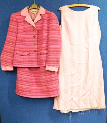 Lot 31 - A ladies pink tweed two piece suit by Harrods...