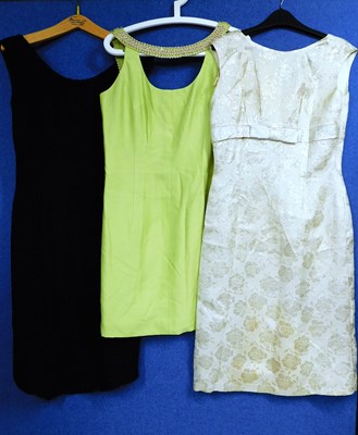 Lot 25 - Three mid 20th Century lady's cocktail dresses:...