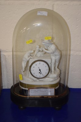 Lot 13 - A French bisque clock, the clock on a plinth...