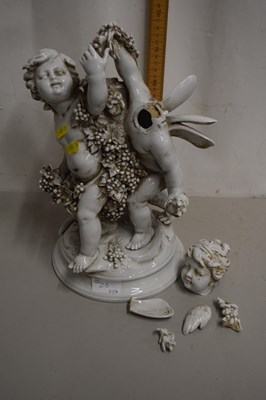 Lot 26 - A large capodimonte white glazed figure of two...