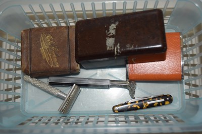 Lot 53 - Plastic box containing vintage razors