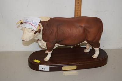 Lot 66 - A Royal Doulton model of a Hereford Bull on...