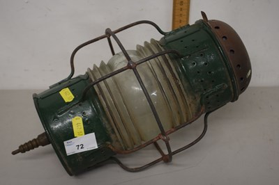 Lot 72 - A vintage green painted metal lamp