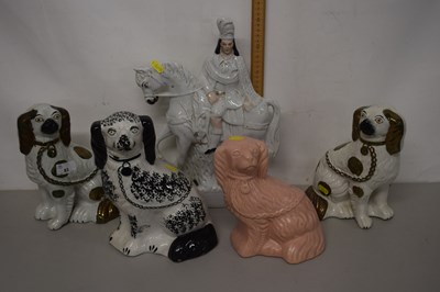 Lot 83 - A collection of Staffordshire dogs, late...