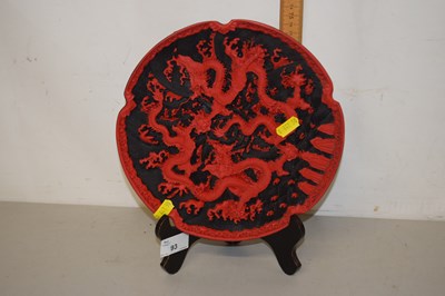 Lot 93 - A Cinnabar lacquer shaped dish with dragon...