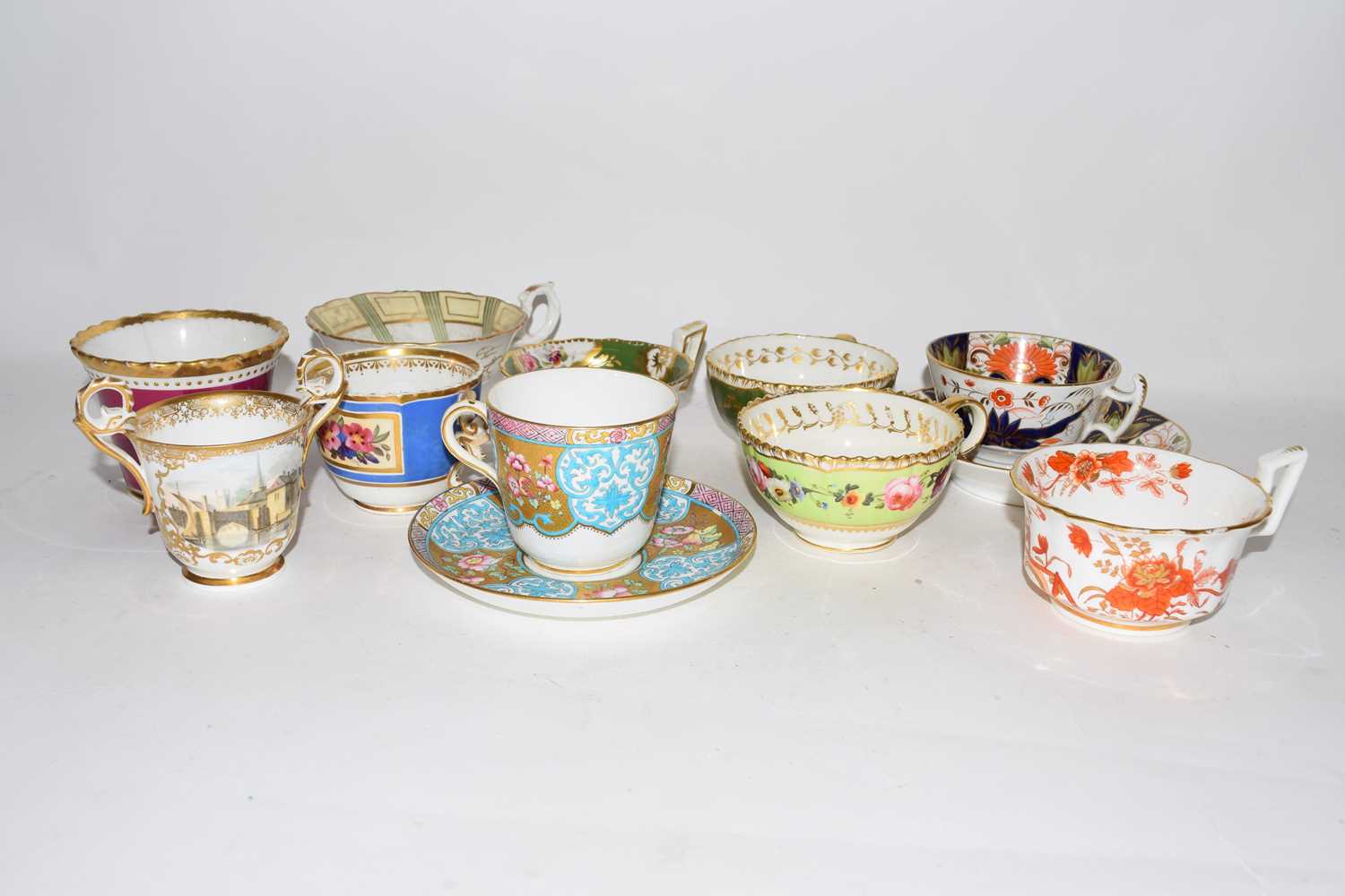 Lot 123 - Group of 19th century English porcelain cups...