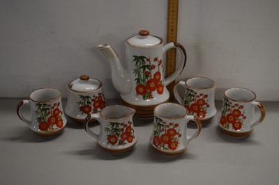 Lot 190 - A boxed stone ware coffee set comprising four...