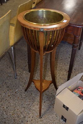 Lot 273 - Mahogany plant stand with copper inset bowl