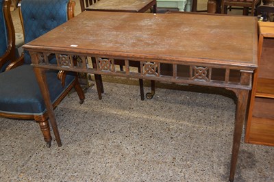 Lot 282 - An oak writing table with carved decoration