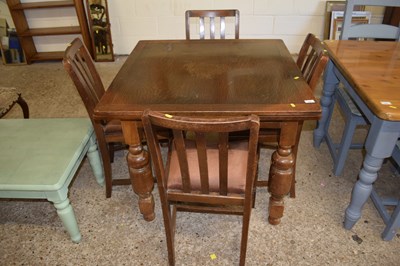 Lot 300 - Extending oak dining table together with a set...