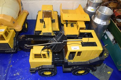 Lot 524 - Three toy Tonka children's dump trucks, crane etc