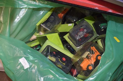 Lot 585 - Bag of boxed toy tractors etc