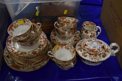 Lot 595 - 20th Century floral and gilded tea set, with...