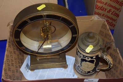 Lot 648 - A Kundo skeleton clock together with lidded...