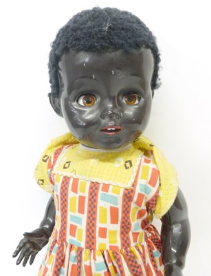 Lot 175 - Mid-20th century ethnic doll by Pedigree, in...