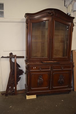 Lot 669 - Mahogany glazed fronted book case on top of...