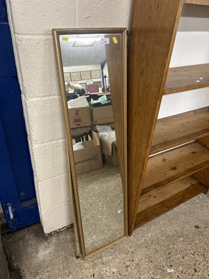 Lot 316 - A narrow rectangular bevelled wall mirror