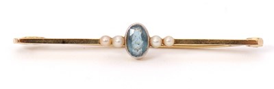 Lot 90 - An aquamarine and pearl bar brooch, the oval...