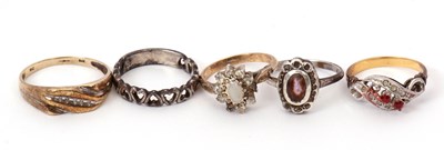 Lot 270 - A 9ct diamond ring and four other rings: the...