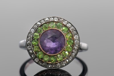 Lot 405 - An early 20th century gemset ring, in...